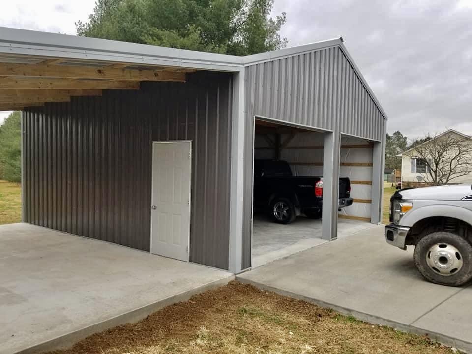 Photo of metal gate with metal electric fence framed with wood posts and rails